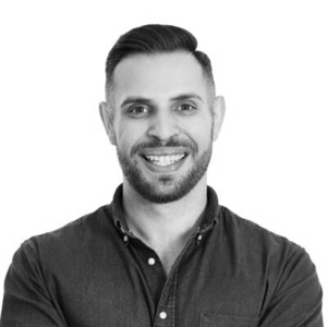 Profile head shot in black and white of Matthew Goodman, Founder of Okendo