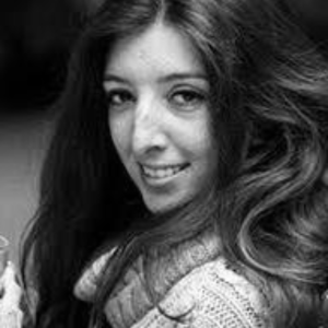 Profile head shot in black and white of Amy Marks.